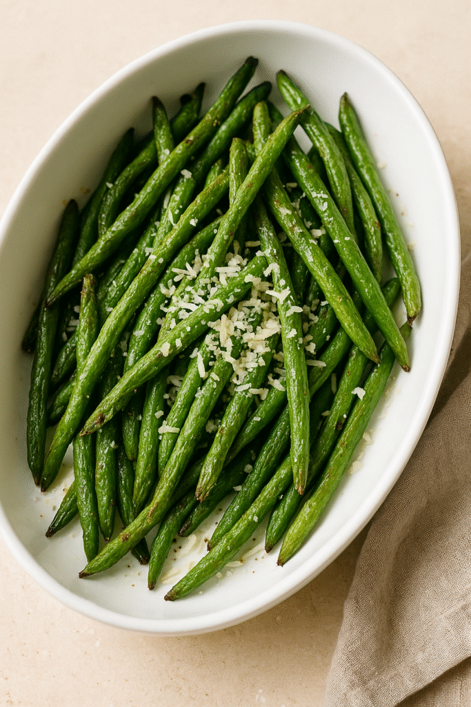 Roasted garlic green beans tossed with garlic butter and grated Parmesan.